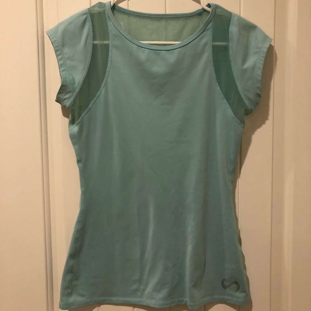 Mint green sports top with sheer back